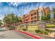 The Park Avenue Condominiums features well-maintained landscaping and attractive architectural details at 91 E Agate Ave # 204, Las Vegas, NV 89123