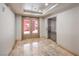 A clean, well-lit elevator lobby with marble flooring and secure access to residential floors at 91 E Agate Ave # 204, Las Vegas, NV 89123