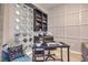 Functional home office space with built-in shelving and comfortable seating at 91 E Agate Ave # 204, Las Vegas, NV 89123