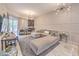 Bright and airy living room with modern lighting and comfortable sectional seating at 91 E Agate Ave # 204, Las Vegas, NV 89123
