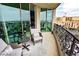 Balcony with decorative railings, outdoor seating and city views at 9101 Alta Dr # 507, Las Vegas, NV 89145