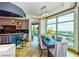 Modern dining area with a stylish table, bar and city views at 9101 Alta Dr # 507, Las Vegas, NV 89145