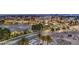 An exterior street view captures the vibrant cityscape and showcases the surrounding area with palm trees at 9101 Alta Dr # 507, Las Vegas, NV 89145