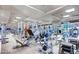 Well-equipped gym with various weight machines, free weights, and workout benches in a spacious area at 9101 Alta Dr # 507, Las Vegas, NV 89145
