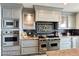 Gourmet kitchen features stainless steel appliances, custom cabinets, and a decorative backsplash at 9101 Alta Dr # 507, Las Vegas, NV 89145