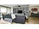 Comfortable living room with built in shelving and large windows at 9101 Alta Dr # 507, Las Vegas, NV 89145