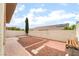 Backyard with stone, rocks and a low block wall at 9289 Mandeville Bay Ave, Las Vegas, NV 89148