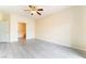 Spacious main bedroom with tile flooring and ensuite bathroom at 9289 Mandeville Bay Ave, Las Vegas, NV 89148