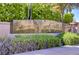 Elegant Vista Verona community sign surrounded by lush greenery and manicured landscaping at 936 Viscanio Pl, Las Vegas, NV 89138