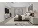 Serene primary bedroom with neutral decor, ample natural light, and stylish furnishings at 936 Viscanio Pl, Las Vegas, NV 89138