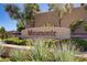 Welcoming 'Miramonte' community sign amidst desert landscaping and mature trees at 936 Viscanio Pl, Las Vegas, NV 89138