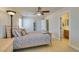 Comfortable bedroom with ceiling fan, closet, and access to ensuite bathroom for added convenience at 9524 Tyler Rose St, Las Vegas, NV 89178
