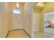 Inviting foyer with a pendant light and tile flooring, leading into the bedroom on the right at 9524 Tyler Rose St, Las Vegas, NV 89178