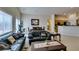 Bright living room featuring an open layout with a combined dining and living area at 9524 Tyler Rose St, Las Vegas, NV 89178