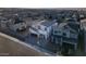 Areal view of community featuring modern home designs and desert landscape at 10204 Kern Peak St, Las Vegas, NV 89166