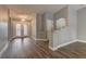 Inviting entryway featuring double doors, decorative glass, and beautiful wood-look flooring at 10311 Slope Ridge St, Las Vegas, NV 89131