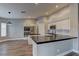Well-equipped kitchen with stainless steel appliances, granite countertops, and neutral paint at 10311 Slope Ridge St, Las Vegas, NV 89131