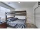Bedroom featuring a bunk bed and closet at 10939 Cheshire Woods Ave, Las Vegas, NV 89166