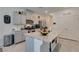Charming kitchen with granite island, stainless appliances, and ample storage at 10939 Cheshire Woods Ave, Las Vegas, NV 89166