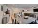 Well-lit living space integrates the kitchen and dining areas, perfect for entertaining and Gathering time at 10939 Cheshire Woods Ave, Las Vegas, NV 89166