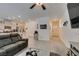 Inviting living room boasts neutral tones, an open floor plan and access to the kitchen and entry at 10939 Cheshire Woods Ave, Las Vegas, NV 89166