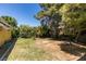 Expansive backyard with mature trees, providing ample shade and privacy at 1127 Melville Dr, Las Vegas, NV 89102