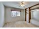Bright bedroom featuring a built-in shelf and window at 1127 Melville Dr, Las Vegas, NV 89102