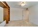 Bright bedroom featuring a ceiling fan and door at 1127 Melville Dr, Las Vegas, NV 89102