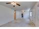 Bright living room featuring neutral carpet and multiple entrances for convenience at 1127 Melville Dr, Las Vegas, NV 89102