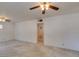 Open living room with neutral carpet and bright light, ready for your personal touch at 1127 Melville Dr, Las Vegas, NV 89102