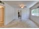 View of bright living room with neutral carpet, featuring an entrance and windows at 1127 Melville Dr, Las Vegas, NV 89102