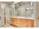 Bright bathroom features a walk-in shower, double sinks, and ample storage space at 11527 Morning Grove Dr, Las Vegas, NV 89135