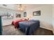 Comfortable bedroom featuring two beds, soft carpet, and natural light from the window at 1191 Starstone Ct, Henderson, NV 89014