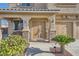 Inviting front porch with double doors and comfortable seating area at 1191 Starstone Ct, Henderson, NV 89014