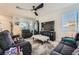 Comfortable living room featuring a large TV and ample seating for relaxation at 1191 Starstone Ct, Henderson, NV 89014