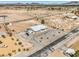 Expansive aerial view of a home with a large lot, landscaping, and desert scenery at 1410 Tiptop Trl, Pahrump, NV 89048