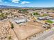 Expansive aerial view of the property highlighting the home's placement on a large lot with mountain views at 1410 Tiptop Trl, Pahrump, NV 89048