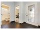 Inviting entryway featuring decorative tile flooring, a stylish front door, and access to other rooms at 145 Austin Rose Ave, Henderson, NV 89002
