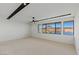 Spacious bedroom with scenic lake view and modern ceiling fan at 1548 Pleasant Bay Ct, Henderson, NV 89011