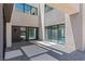 Stunning entrance featuring a combination of stone and concrete in geometric patterns at 1548 Pleasant Bay Ct, Henderson, NV 89011