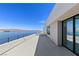 Balcony with lake view, modern railing, and white exterior at 1548 Pleasant Bay Ct, Henderson, NV 89011