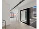 Bright foyer with sleek tile flooring, and modern front door with lake views at 1548 Pleasant Bay Ct, Henderson, NV 89011