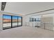 Living room features sliding glass doors and scenic views at 1548 Pleasant Bay Ct, Henderson, NV 89011