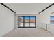 Bright living room with lake views, modern lighting, and sleek railings at 1548 Pleasant Bay Ct, Henderson, NV 89011