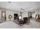 Comfortable living room with tile flooring, ceiling fan and plenty of natural light at 16 Via Stefano, Henderson, NV 89011
