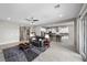 Open-concept living area with tile flooring and a seamless flow into the kitchen at 16 Via Stefano, Henderson, NV 89011