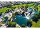 Aerial view of community park with multiple ponds and green space for community recreation at 2112 Merganser Ct, North Las Vegas, NV 89084