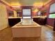 Bright bathroom features a large soaking tub, dual vanities, and tile flooring at 2112 Merganser Ct, North Las Vegas, NV 89084
