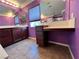 Bathroom with vanity, drawers, and countertop workspace by window at 2112 Merganser Ct, North Las Vegas, NV 89084