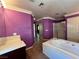Open bathroom featuring a soaking tub, shower, and ample space at 2112 Merganser Ct, North Las Vegas, NV 89084